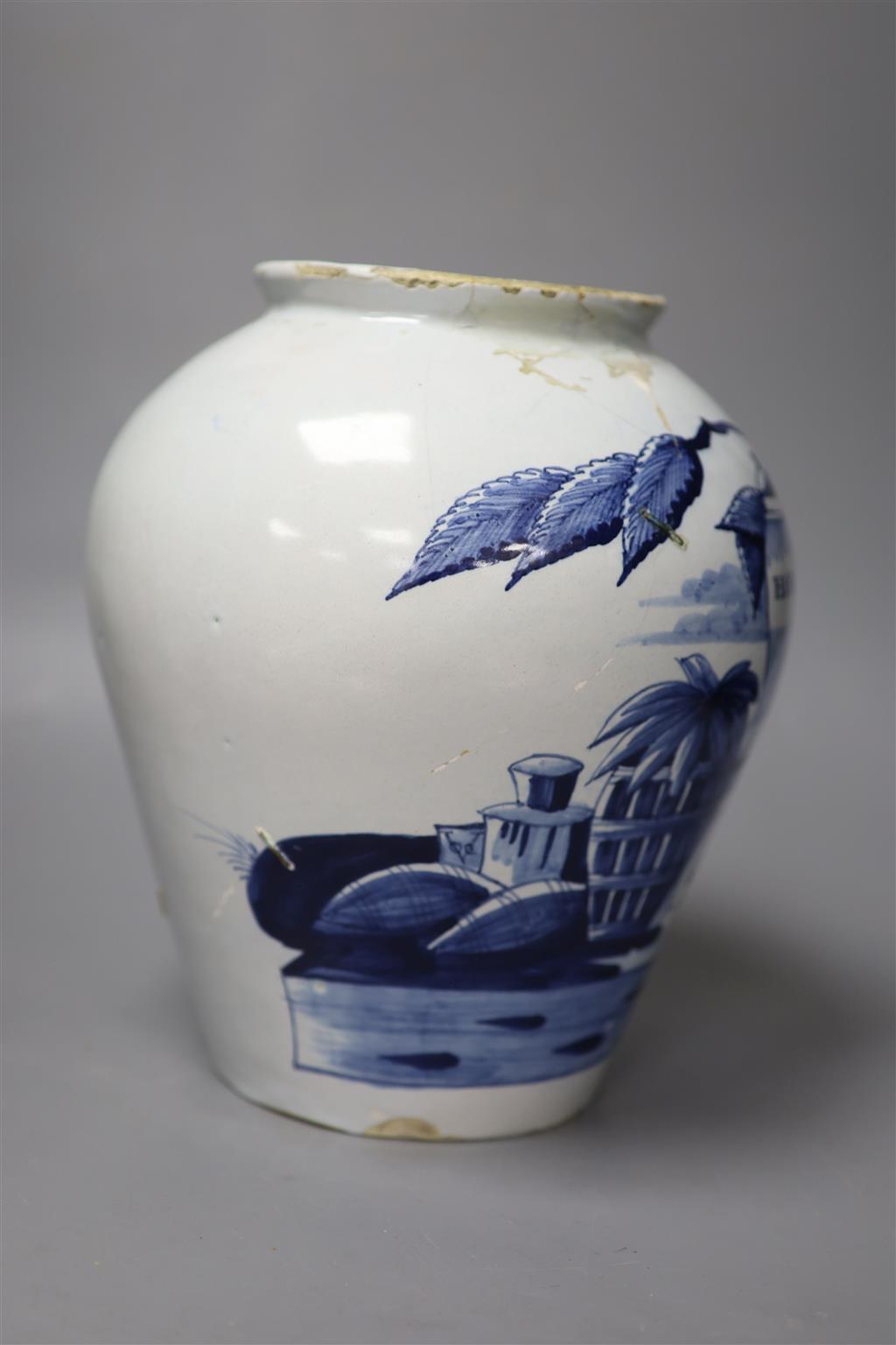 An 18th century Delft Havana tobacco jar, height 26cm (not including cover) (a.f.)